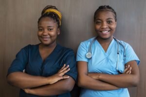 front-view-smiley-nurses-work-min